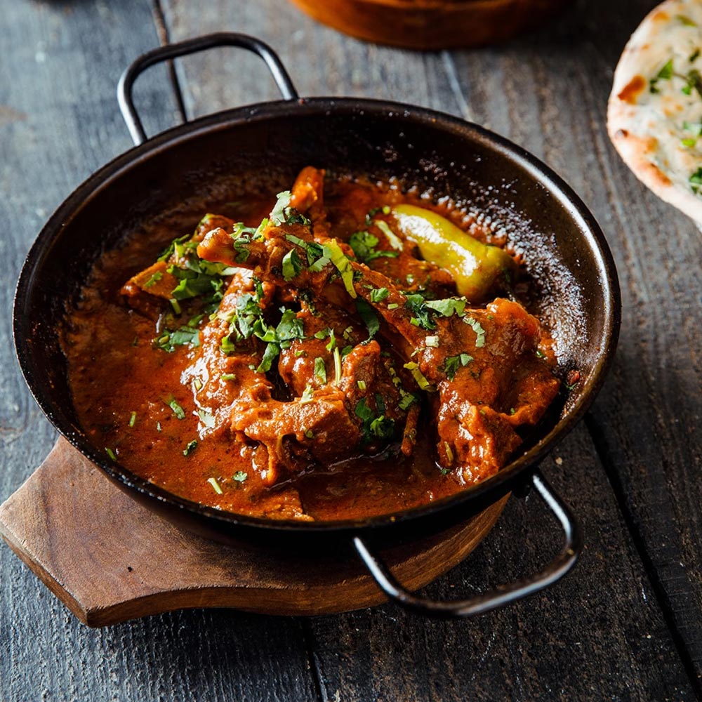 Balti curry cooked in a karahi